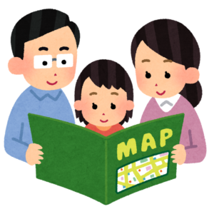 地図を見る家族